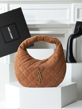 Yves Saint Laurent Quilted Suede Hobo Bag with Cassandre Logo